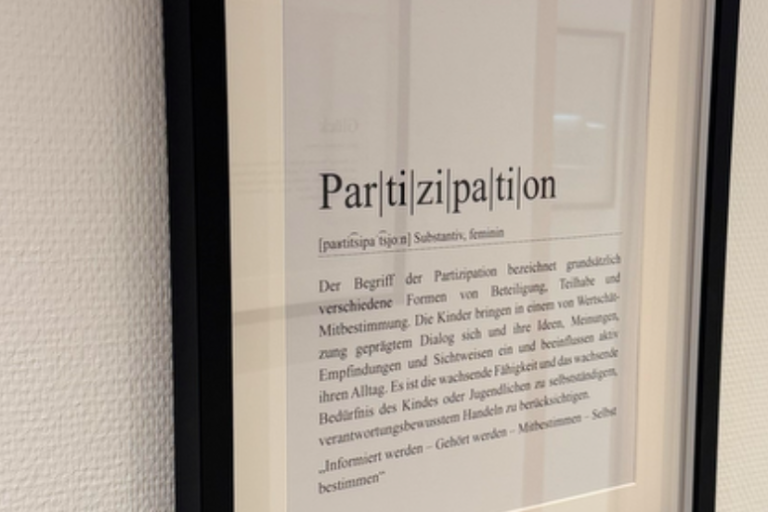 Ein gerahmter Text über das Thema "Partizipation" in deutscher Sprache.